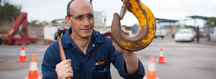 Joe Stefano from Q Mechanical inspects a crane