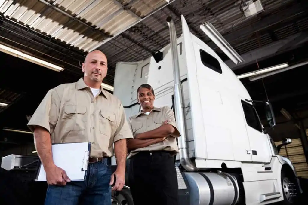 Workers-in-garage-image